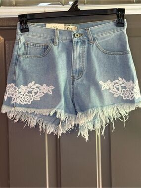 Umgee Light Blue Denim Shorts with White Floral Applique and Frayed Hem